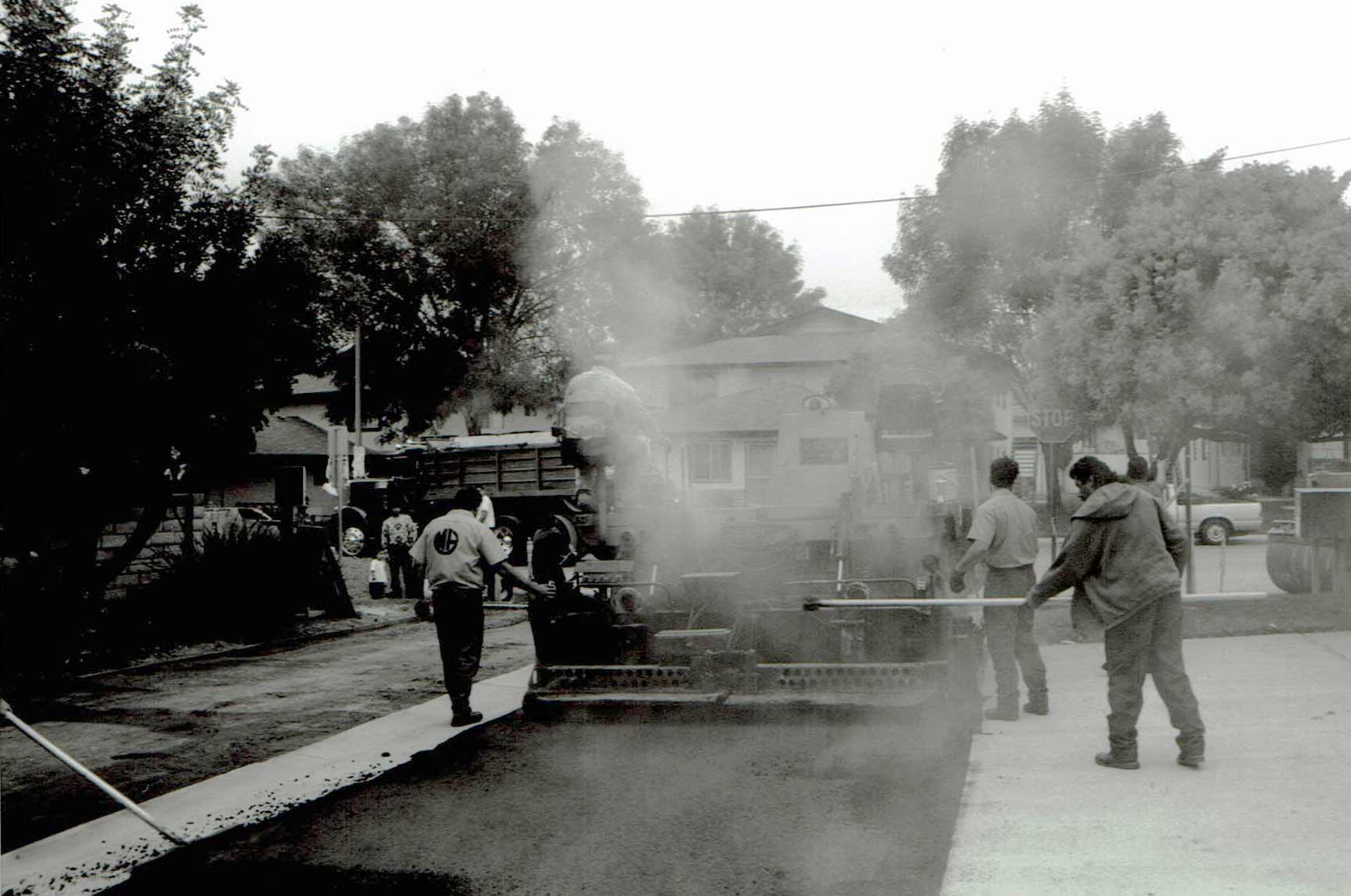 Paving in Newbury Park - Marcos Osuna on a lute, the man who taught Gordon how to rake asphalt. 1
