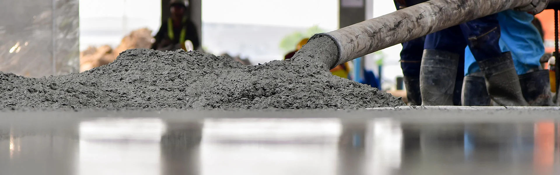 A machine pouring concrete installation, on one of GPM's jobs for installation, repair, and reconstruction in California.