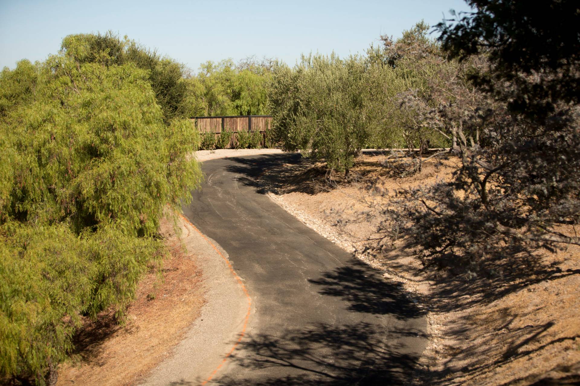 The road before GPM completed the chip seal project in Santa Ynez.