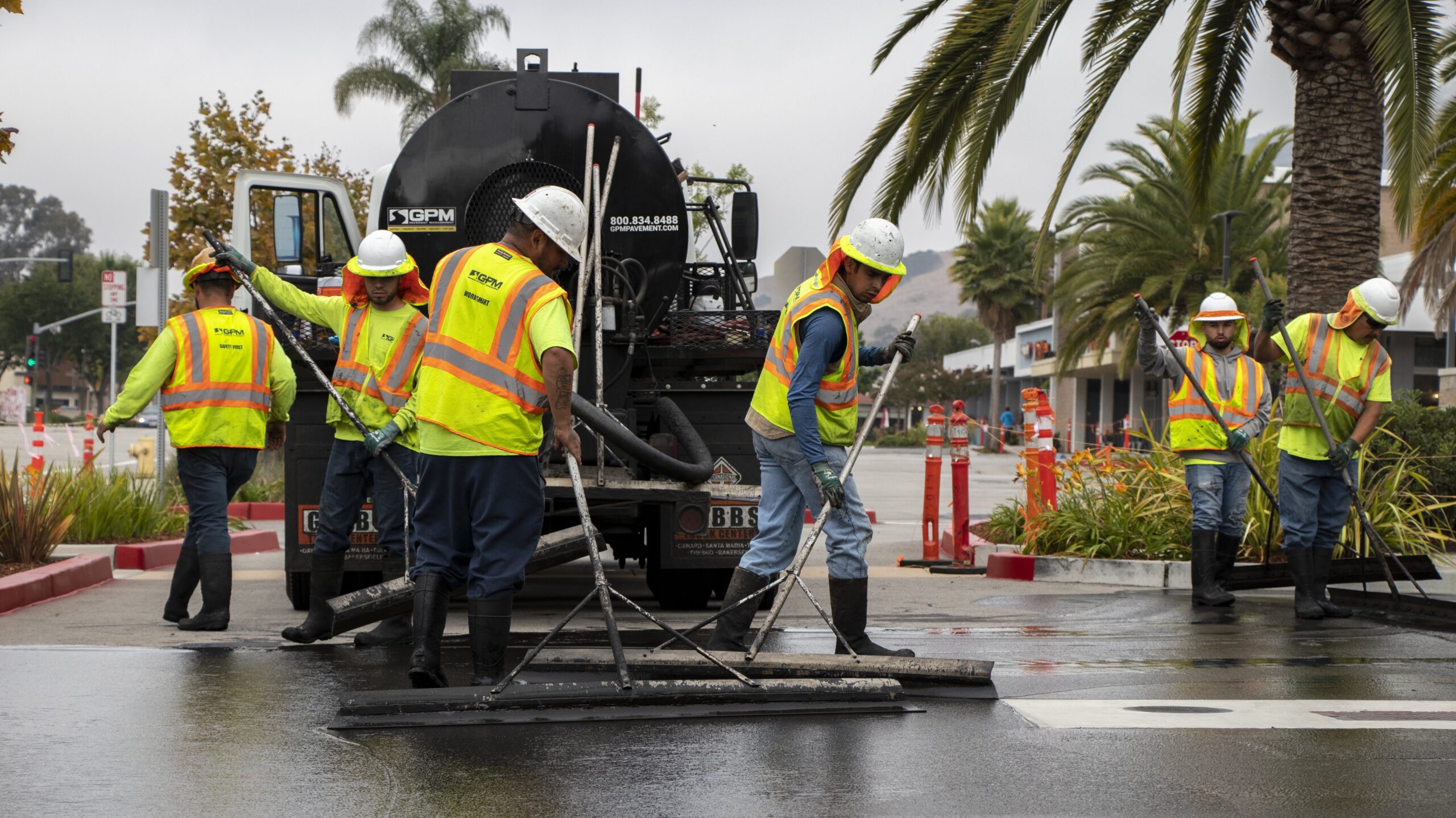 The crew of the top commercial paving company in Valencia, California, working on an asphalt installation project.